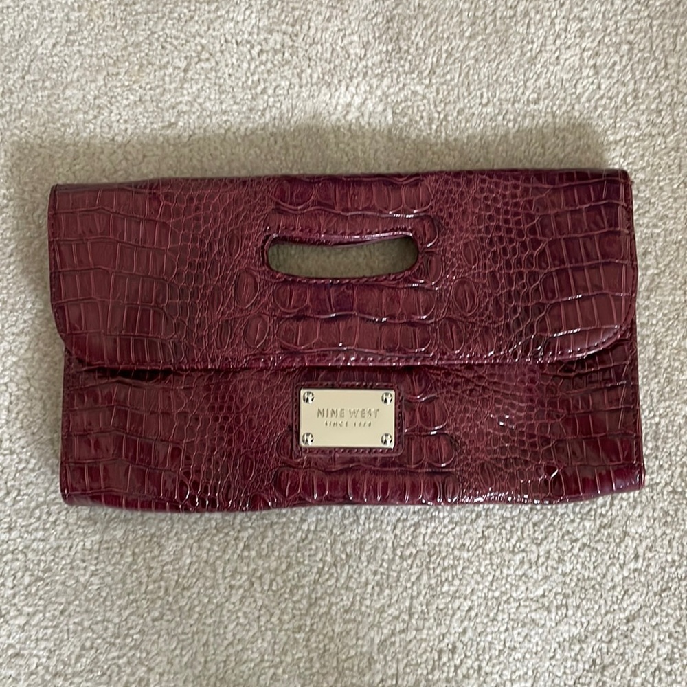 Nine West wine colored envelope clutch
